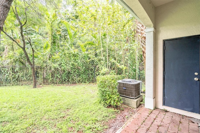 8206 SW 29th St Unit 104, Miramar, FL 33025 - view of yard with central AC unit and a patio