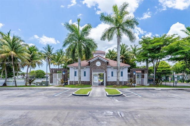 8206 SW 29th St Unit 104, Miramar, FL 33025 - view of building exterior with uncovered parking