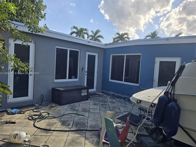 5812 NW 20th Ct, Margate, FL 33063 - back of house with a patio and stucco siding