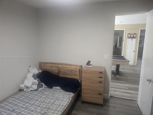 5812 NW 20th Ct, Margate, FL 33063 - bedroom with wood finished floors and baseboards