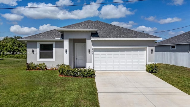 2013 Inglewood Cir, La Belle, FL 33935 - view of front of property featuring roof with shingles, stucco siding, concrete driveway, a front yard, and a garage