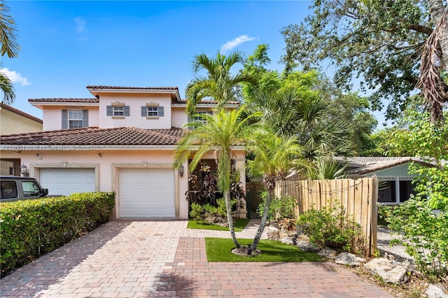 849 SW 11th Ct, Fort Lauderdale, FL 33315 - view of front of house featuring decorative driveway, stucco siding, and a tile roof