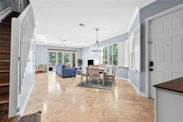 849 SW 11th Ct, Fort Lauderdale, FL 33315 - dining area featuring ornamental molding, baseboards, a chandelier, and light tile patterned floors