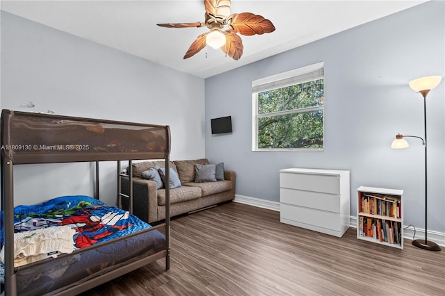 849 SW 11th Ct, Fort Lauderdale, FL 33315 - bedroom with baseboards, wood finished floors, and a ceiling fan