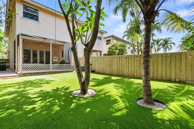 849 SW 11th Ct, Fort Lauderdale, FL 33315 - view of yard featuring a sunroom and a deck