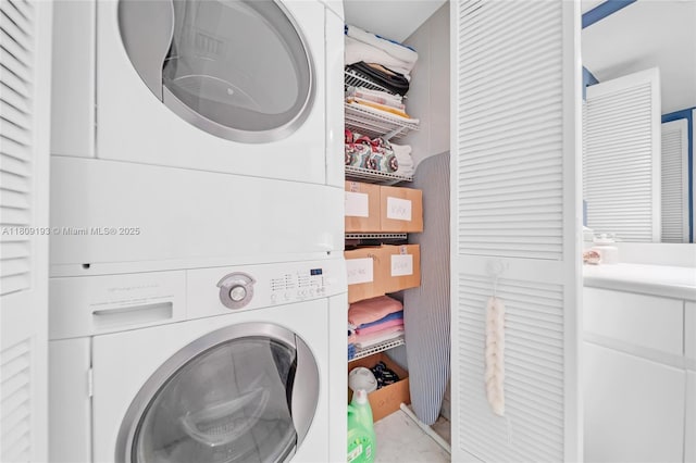 16445 Collins Ave Unit 2226, Sunny Isles Beach, FL 33160 - laundry area featuring stacked washing machine and dryer