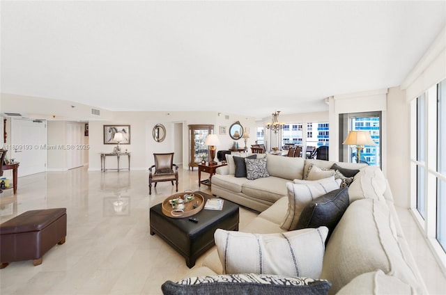16445 Collins Ave Unit 2226, Sunny Isles Beach, FL 33160 - living room featuring a chandelier, light tile patterned flooring, and baseboards