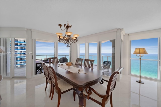 16445 Collins Ave Unit 2226, Sunny Isles Beach, FL 33160 - dining space featuring light tile patterned floors, a water view, and plenty of natural light