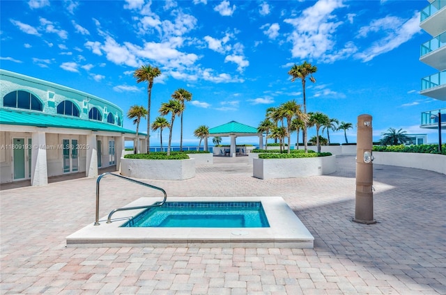 16445 Collins Ave Unit 2226, Sunny Isles Beach, FL 33160 - view of swimming pool with a gazebo, a hot tub, a patio area, and french doors