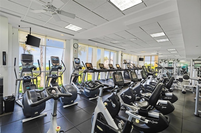 16445 Collins Ave Unit 2226, Sunny Isles Beach, FL 33160 - gym featuring a paneled ceiling and expansive windows