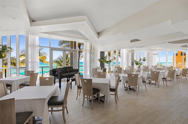 16445 Collins Ave Unit 2226, Sunny Isles Beach, FL 33160 - dining area with light wood-style flooring and healthy amount of natural light