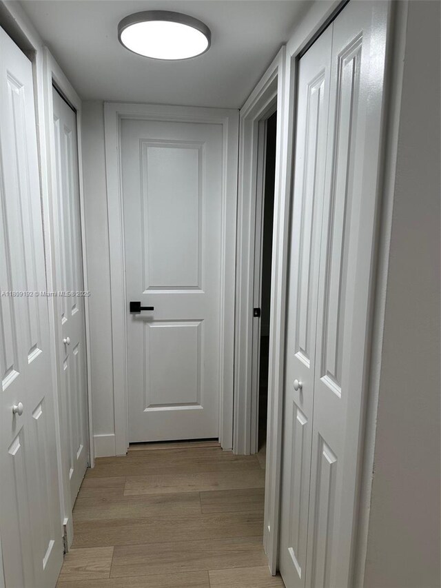 9201 Sunrise Lakes Blvd Unit 301, Sunrise, FL 33322 - hallway with light wood-style floors
