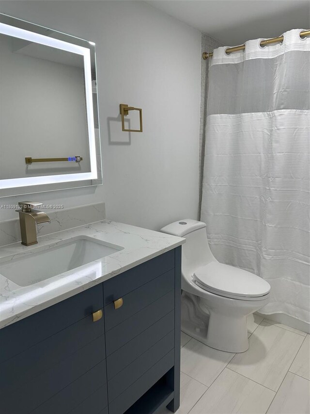 9201 Sunrise Lakes Blvd Unit 301, Sunrise, FL 33322 - full bath with vanity, toilet, and a shower with curtain