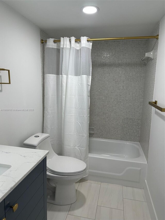 9201 Sunrise Lakes Blvd Unit 301, Sunrise, FL 33322 - full bath with vanity, shower / bath combo with shower curtain, and toilet