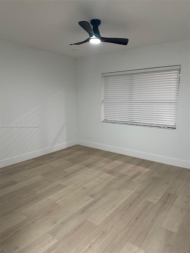 9201 Sunrise Lakes Blvd Unit 301, Sunrise, FL 33322 - spare room with light wood-type flooring, ceiling fan, and baseboards