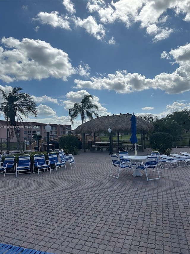 9201 Sunrise Lakes Blvd Unit 301, Sunrise, FL 33322 - view of patio featuring a gazebo