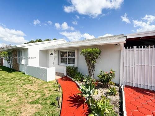 11321 SW 162nd Ter, Miami, FL 33157 - view of front of property with stucco siding