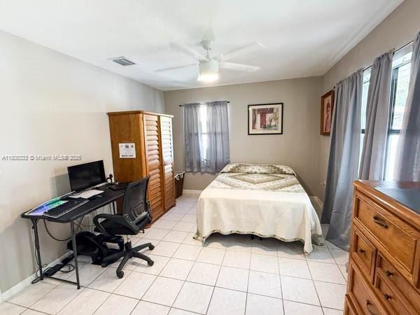 11321 SW 162nd Ter, Miami, FL 33157 - bedroom with ceiling fan and an office area