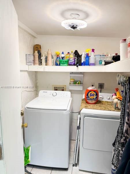 11321 SW 162nd Ter, Miami, FL 33157 - laundry room with washing machine and dryer and light tile patterned flooring