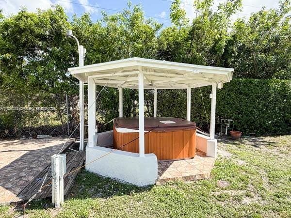 11321 SW 162nd Ter, Miami, FL 33157 - view of patio featuring a hot tub