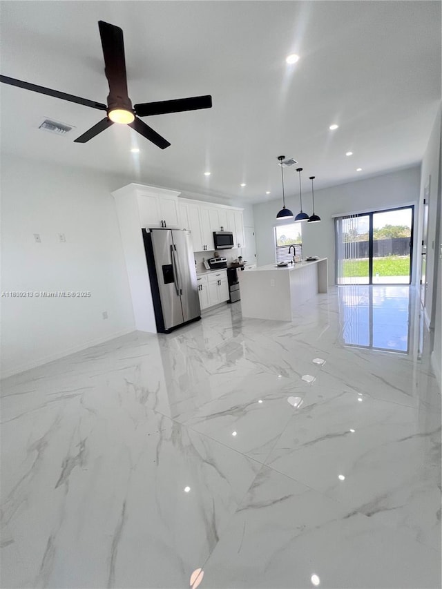 2903 W 64th St, Lehigh Acres, FL 33971 - unfurnished living room featuring light marble finish floors, recessed lighting, a ceiling fan, a sink, and baseboards