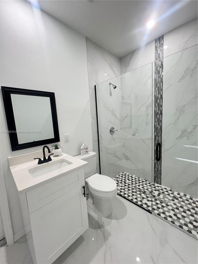 2903 W 64th St, Lehigh Acres, FL 33971 - full bath with toilet, a marble finish shower, marble finish flooring, and vanity