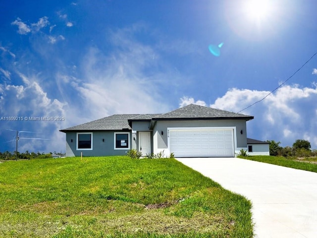 9016 E Justice Crk, La Belle, FL 33935 - single story home with concrete driveway, a garage, a front yard, and stucco siding