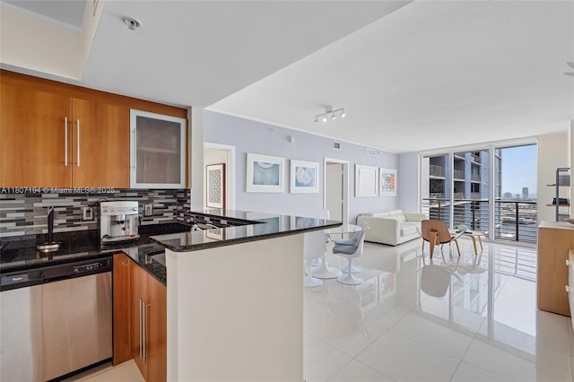 325 S Biscayne Blvd Unit 3926, Miami, FL 33131 - kitchen featuring dishwasher, brown cabinets, open floor plan, and tasteful backsplash