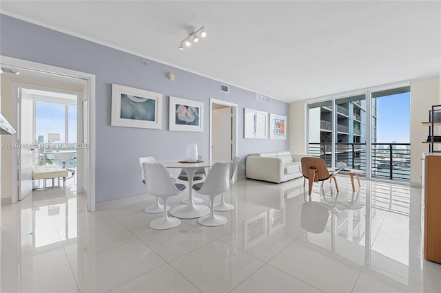 325 S Biscayne Blvd Unit 3926, Miami, FL 33131 - tiled dining space featuring baseboards
