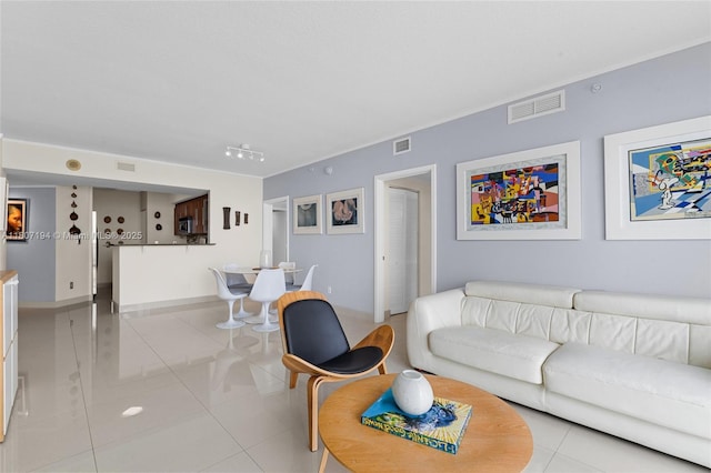 325 S Biscayne Blvd Unit 3926, Miami, FL 33131 - living room featuring light tile patterned floors and baseboards