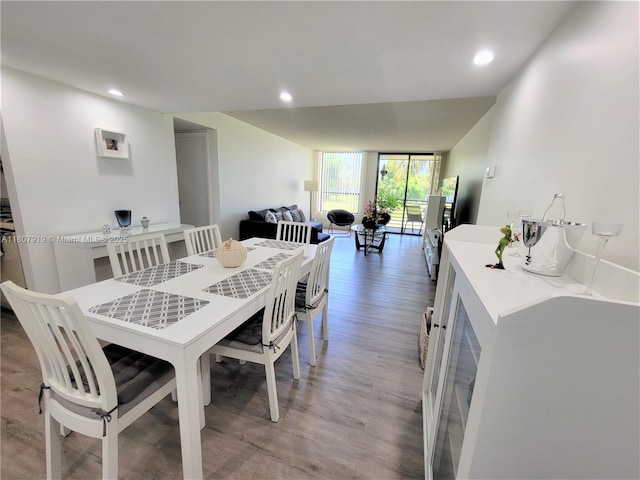 7950 W Mcnab Rd Unit 214, Tamarac, FL 33321 - dining area featuring light wood-type flooring, recessed lighting, and a wall of windows