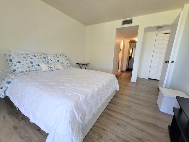 7950 W Mcnab Rd Unit 214, Tamarac, FL 33321 - bedroom featuring wood finished floors and baseboards