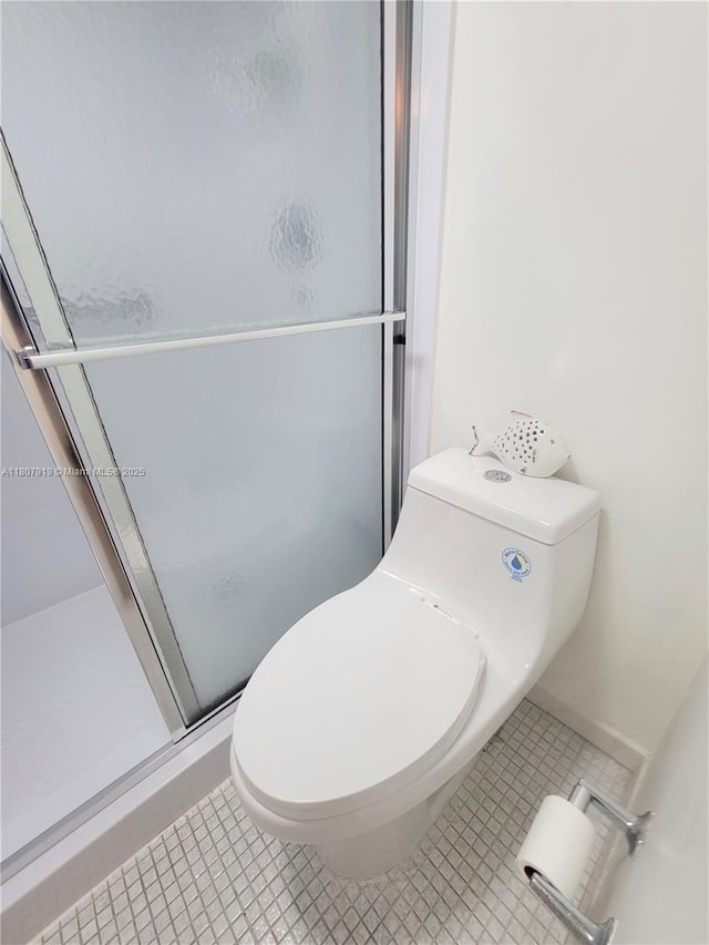 7950 W Mcnab Rd Unit 214, Tamarac, FL 33321 - bathroom with toilet and a shower stall