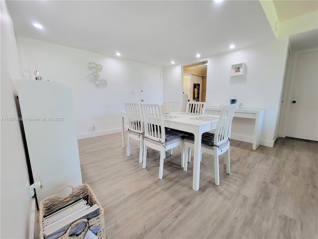 7950 W Mcnab Rd Unit 214, Tamarac, FL 33321 - dining area with light wood finished floors, baseboards, and recessed lighting