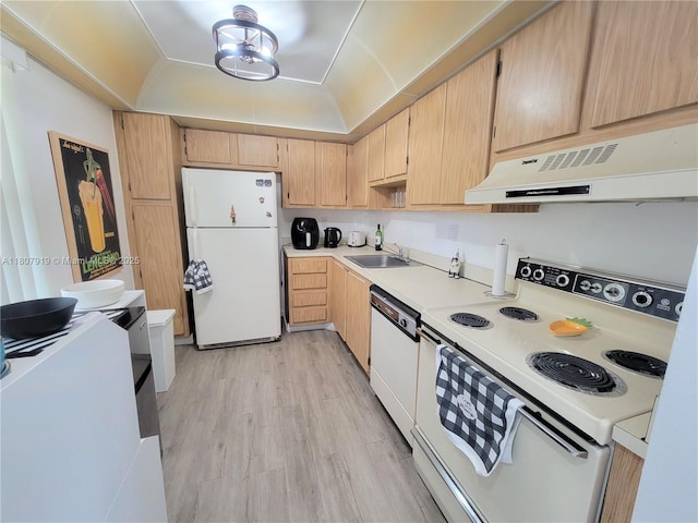 7950 W Mcnab Rd Unit 214, Tamarac, FL 33321 - kitchen featuring white appliances, under cabinet range hood, a sink, light countertops, and light wood finished floors