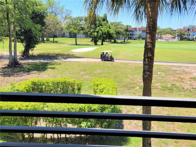 7950 W Mcnab Rd Unit 214, Tamarac, FL 33321 - view of property's community with a lawn