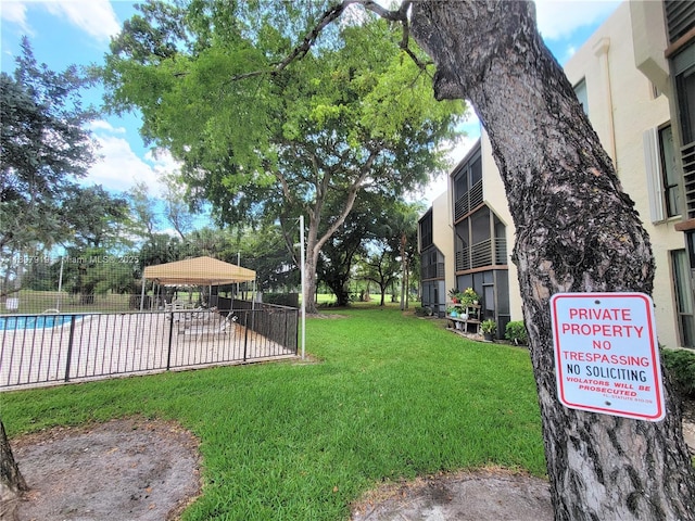 7950 W Mcnab Rd Unit 214, Tamarac, FL 33321 - view of yard with a gazebo