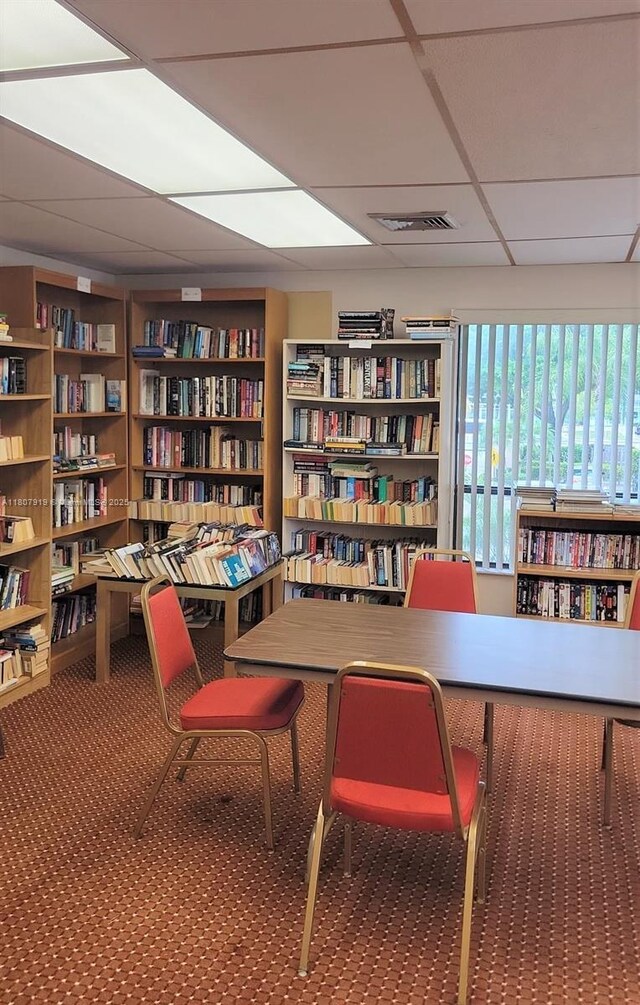 7950 W Mcnab Rd Unit 214, Tamarac, FL 33321 - office featuring a drop ceiling, bookshelves, and carpet