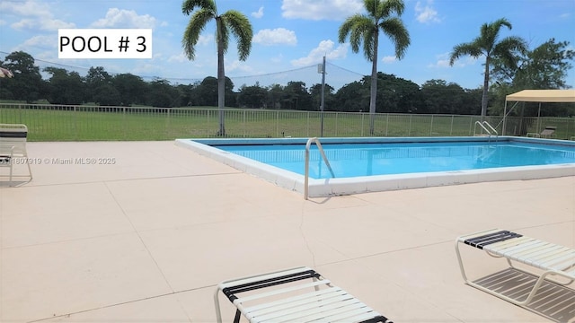 7950 W Mcnab Rd Unit 214, Tamarac, FL 33321 - community pool featuring a patio area