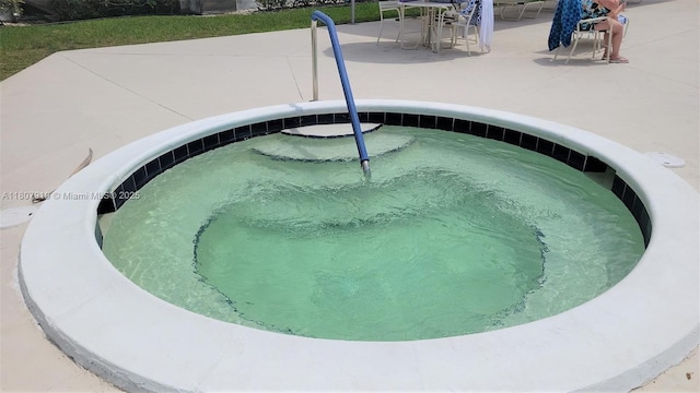 7950 W Mcnab Rd Unit 214, Tamarac, FL 33321 - view of swimming pool featuring a patio