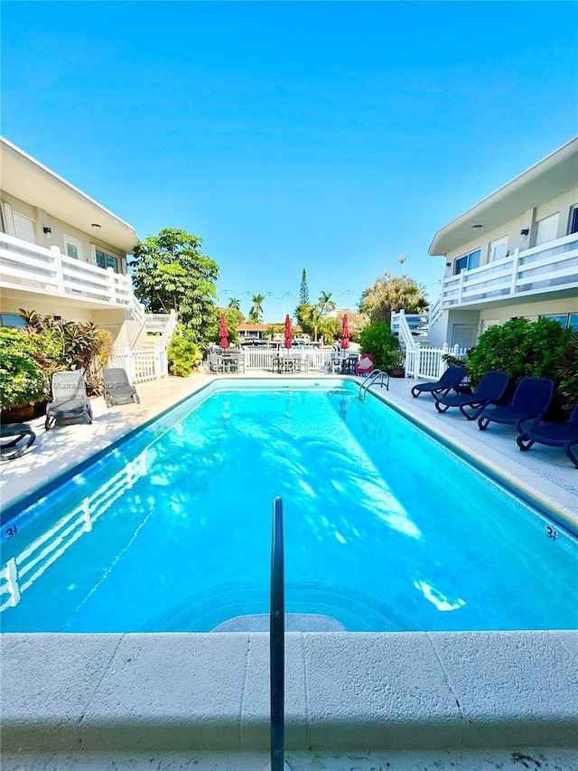 1601 SE 15th St Unit 1B, Fort Lauderdale, FL 33316 - outdoor pool featuring stairway and a patio area