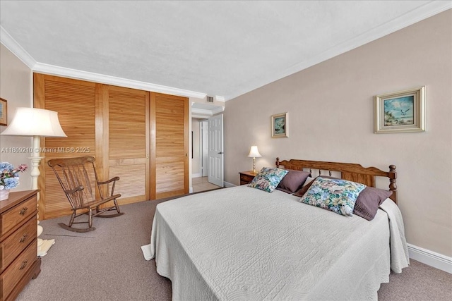 3111 N Ocean Dr Unit 904, Hollywood, FL 33019 - bedroom with ornamental molding, carpet flooring, baseboards, and a closet