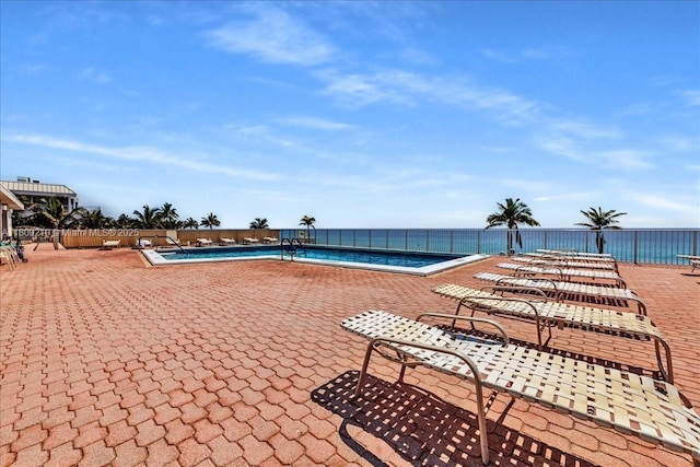 3111 N Ocean Dr Unit 904, Hollywood, FL 33019 - community pool with a patio and a water view