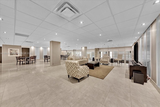 3111 N Ocean Dr Unit 904, Hollywood, FL 33019 - living area featuring a drop ceiling and light tile patterned floors