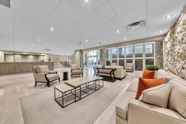 3111 N Ocean Dr Unit 904, Hollywood, FL 33019 - living room featuring a drop ceiling and recessed lighting