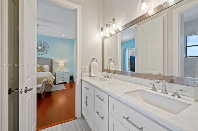 13990 SW 41st St, Davie, FL 33330 - full bath with ensuite bath, double vanity, and wood finished floors