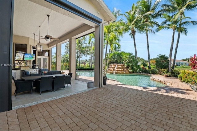 13990 SW 41st St, Davie, FL 33330 - outdoor pool featuring a patio, a ceiling fan, and outdoor dining space