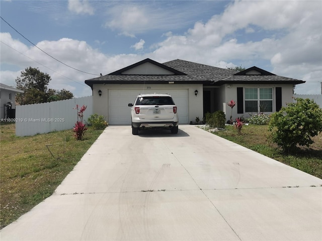 2116 5th Pl, Cape Coral, FL 33909 - single story home featuring concrete driveway, an attached garage, stucco siding, and roof with shingles