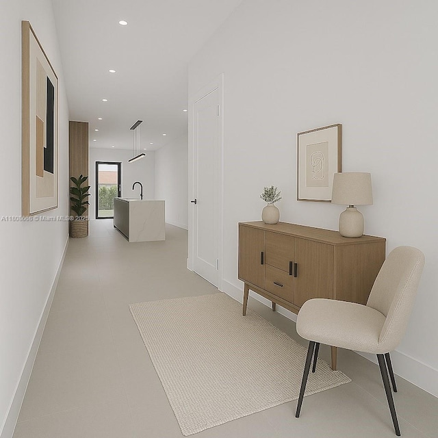 2839 SW 25th St, Miami, FL 33133 - hall featuring baseboards, recessed lighting, and a sink
