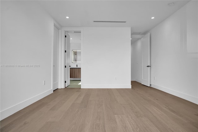 2839 SW 25th St, Miami, FL 33133 - empty room with light wood finished floors, recessed lighting, baseboards, and a smoke detector